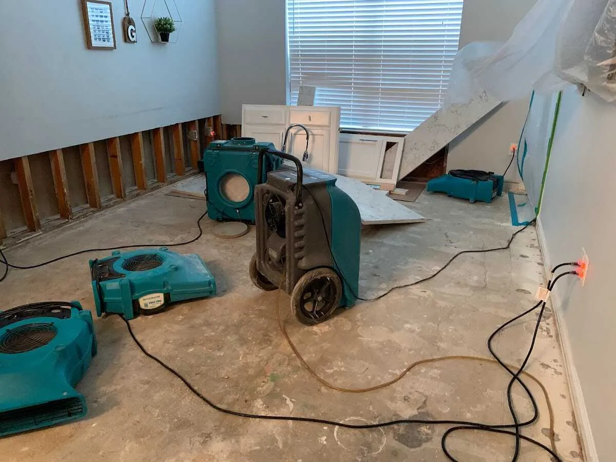Dehumidifier in flood-cut room for Water Damage Restoration in Clarinda